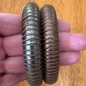 Silver and copper colored bangle bracelets with brass wiring. Handmade. Leather